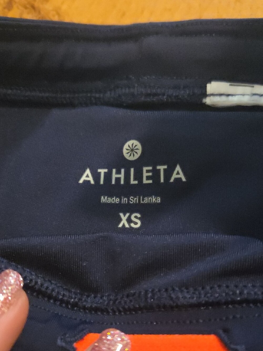 Athleta Navy Swim Bottom with Bright Orange Accents - Picture 2 of 3